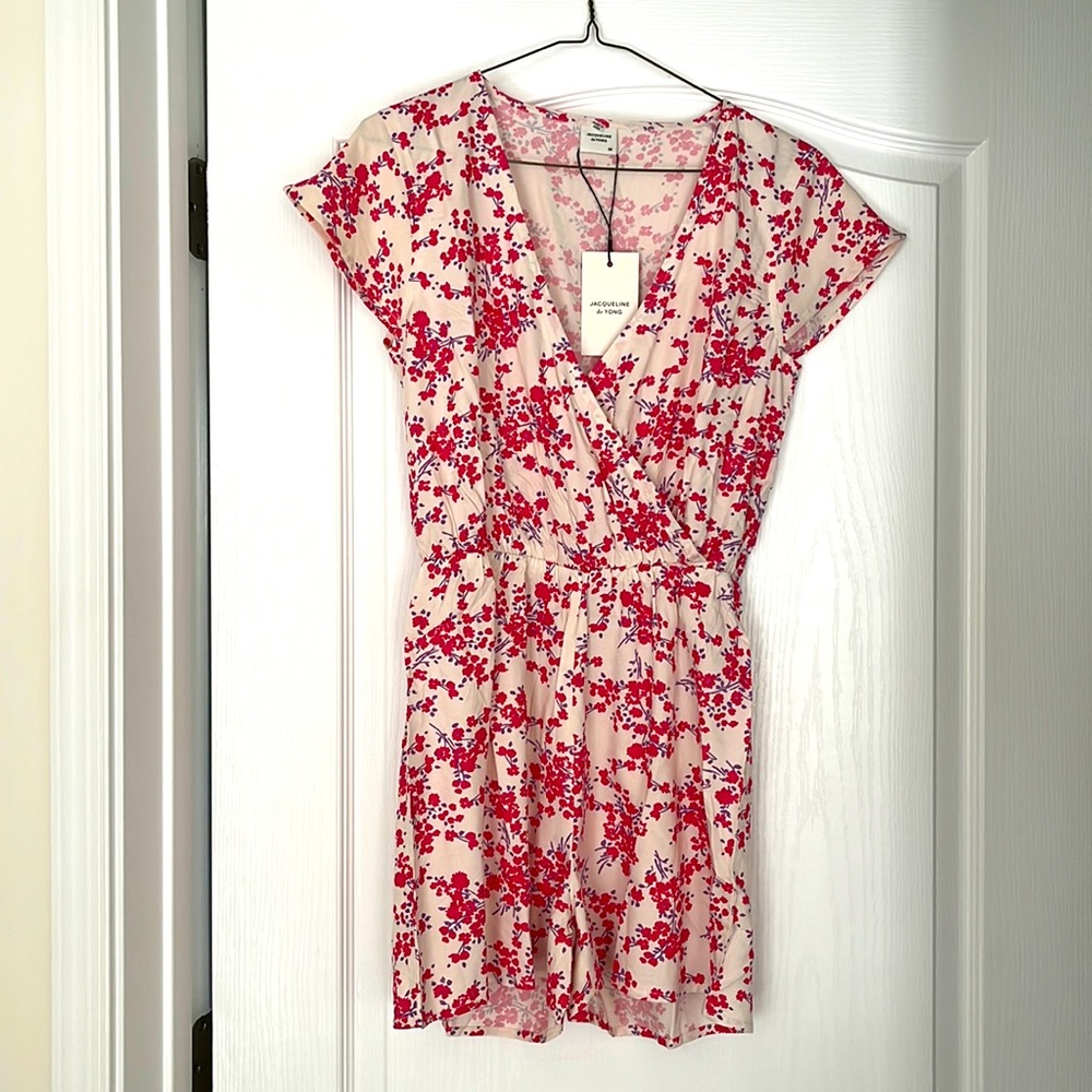 New with tags, pink/purple/cream floral romper/play suit.